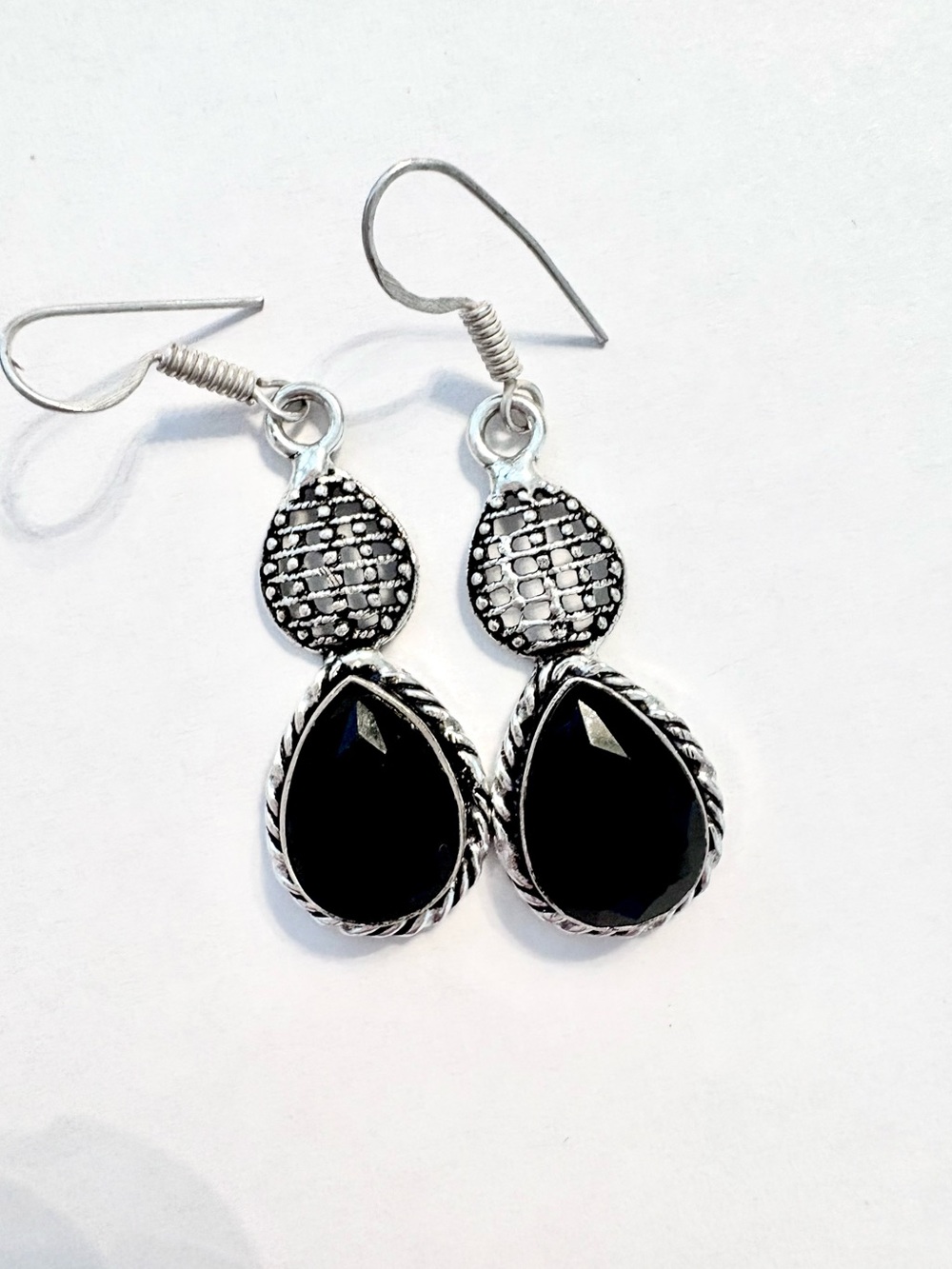 Beautiful, 2 inch, 925 marked, faceted, black Onyx earrings .